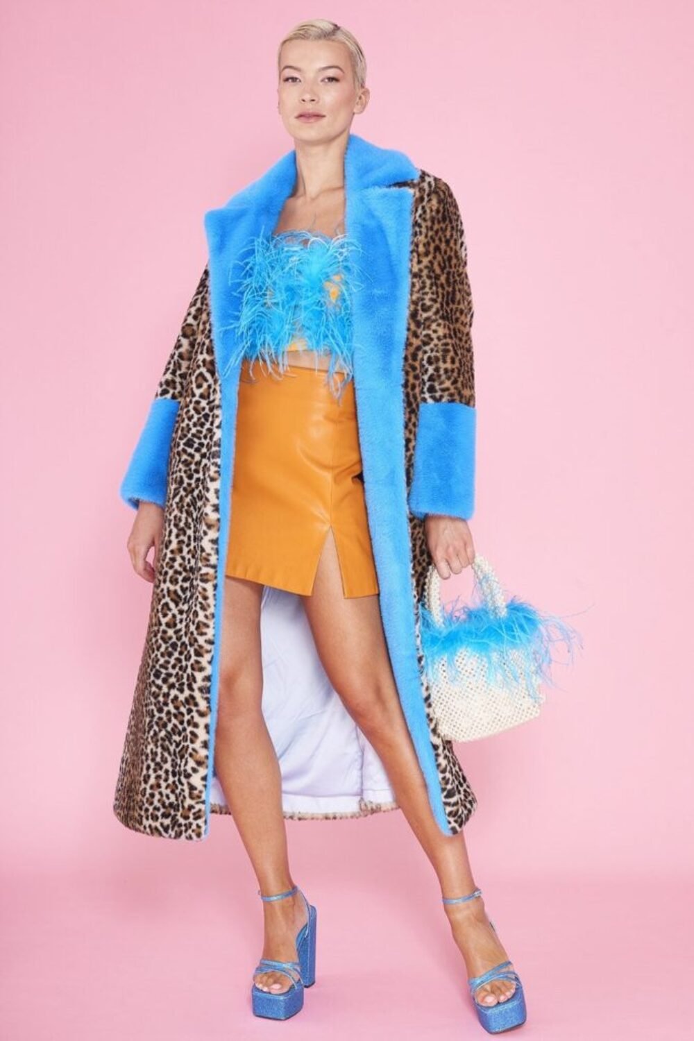 Shop Lux Animal Print Faux Fur Maxi Coat with Clashing Blue Cuffs and Collar and women's luxury and designer clothes at www.lux-apparel.co.uk