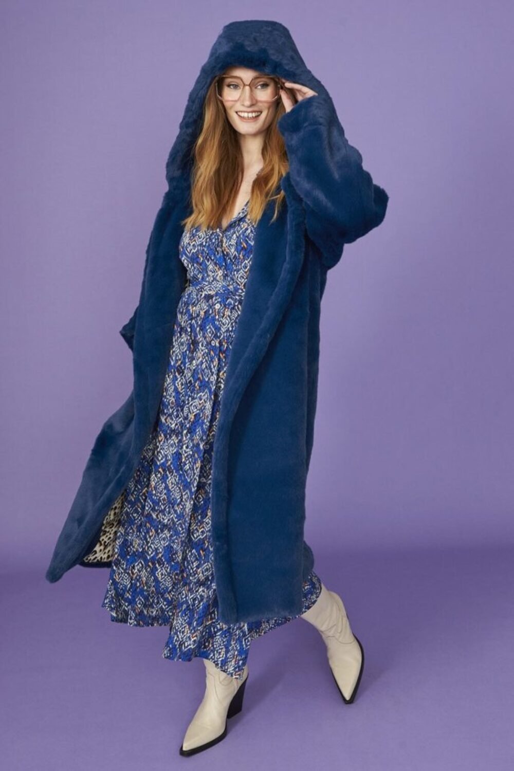 Shop Lux Bold Blue Hooded Faux Fur Coat with Button Fastening and women's luxury and designer clothes at www.lux-apparel.co.uk