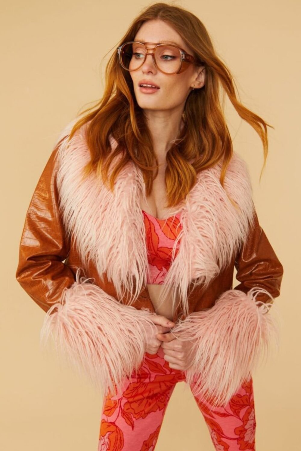 Shop Lux Brown Faux Leather Biker Jacket with Pink Mongolian Fur Cuffs And Collar and women's luxury and designer clothes at www.lux-apparel.co.uk