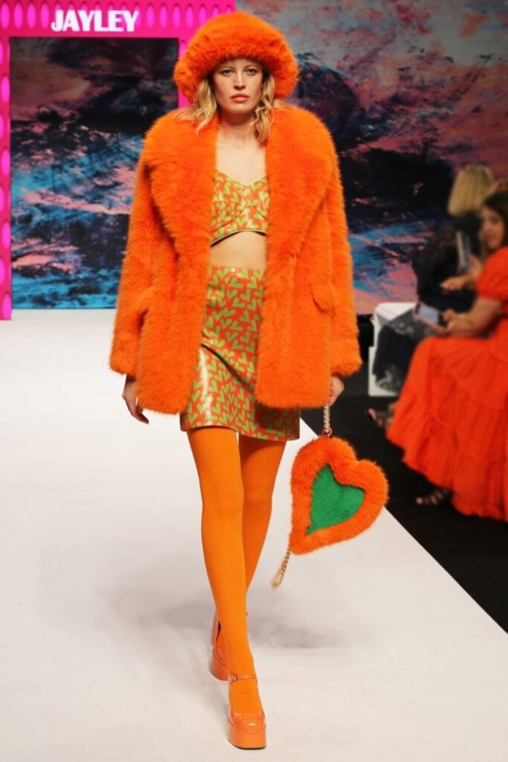 Shop Lux Faux Fur Orange Midi Coat and women's luxury and designer clothes at www.lux-apparel.co.uk