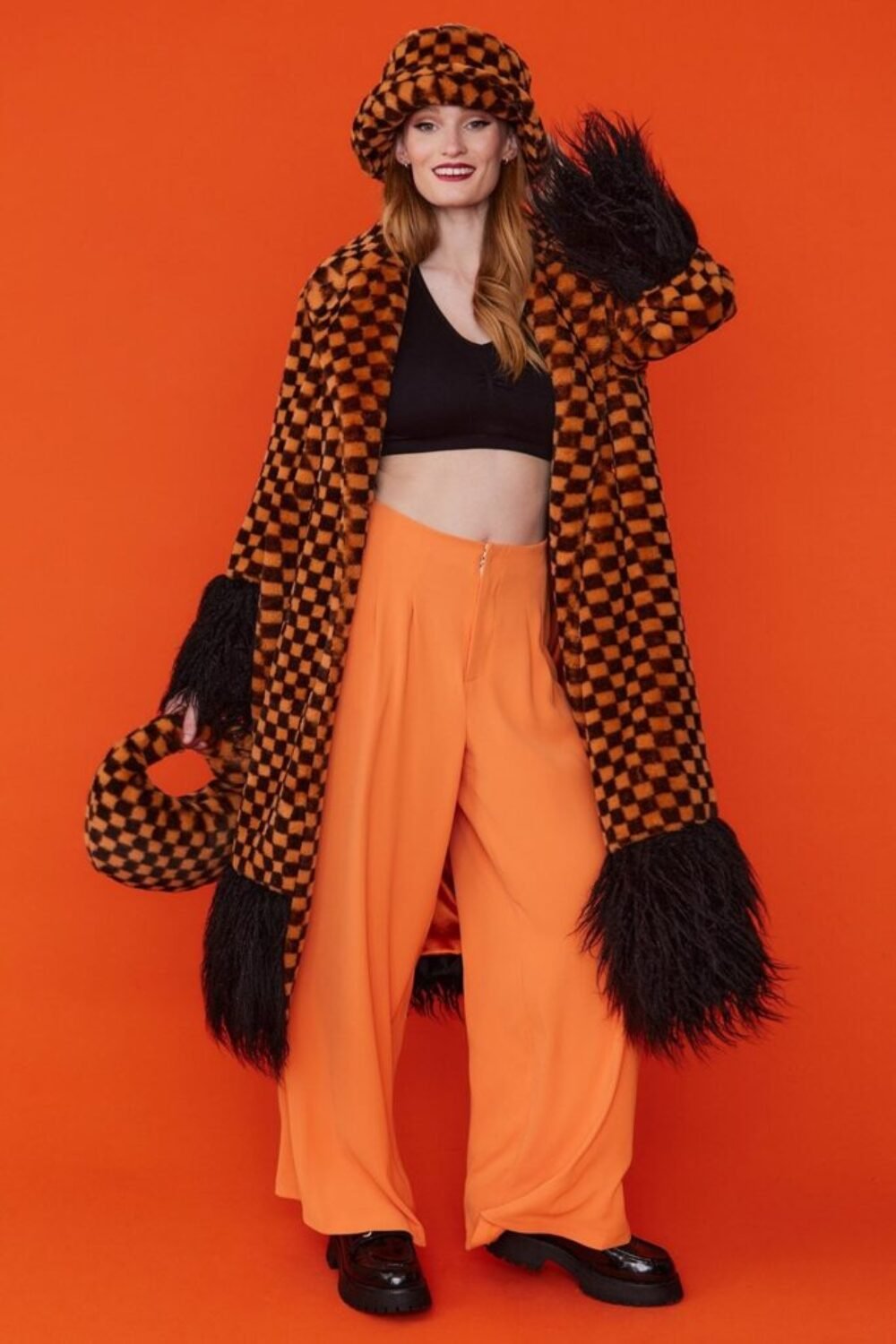 Shop Lux Faux Fur Orange and Black Check Coat with Faux Mongolian Trim and women's luxury and designer clothes at www.lux-apparel.co.uk
