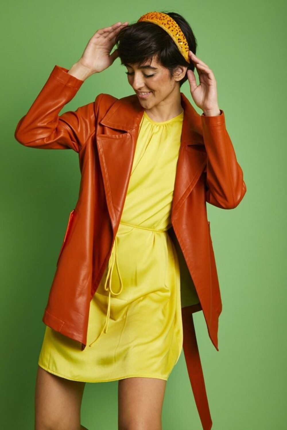Shop Lux Orange Eco Leather Midi Trench Coat and women's luxury and designer clothes at www.lux-apparel.co.uk