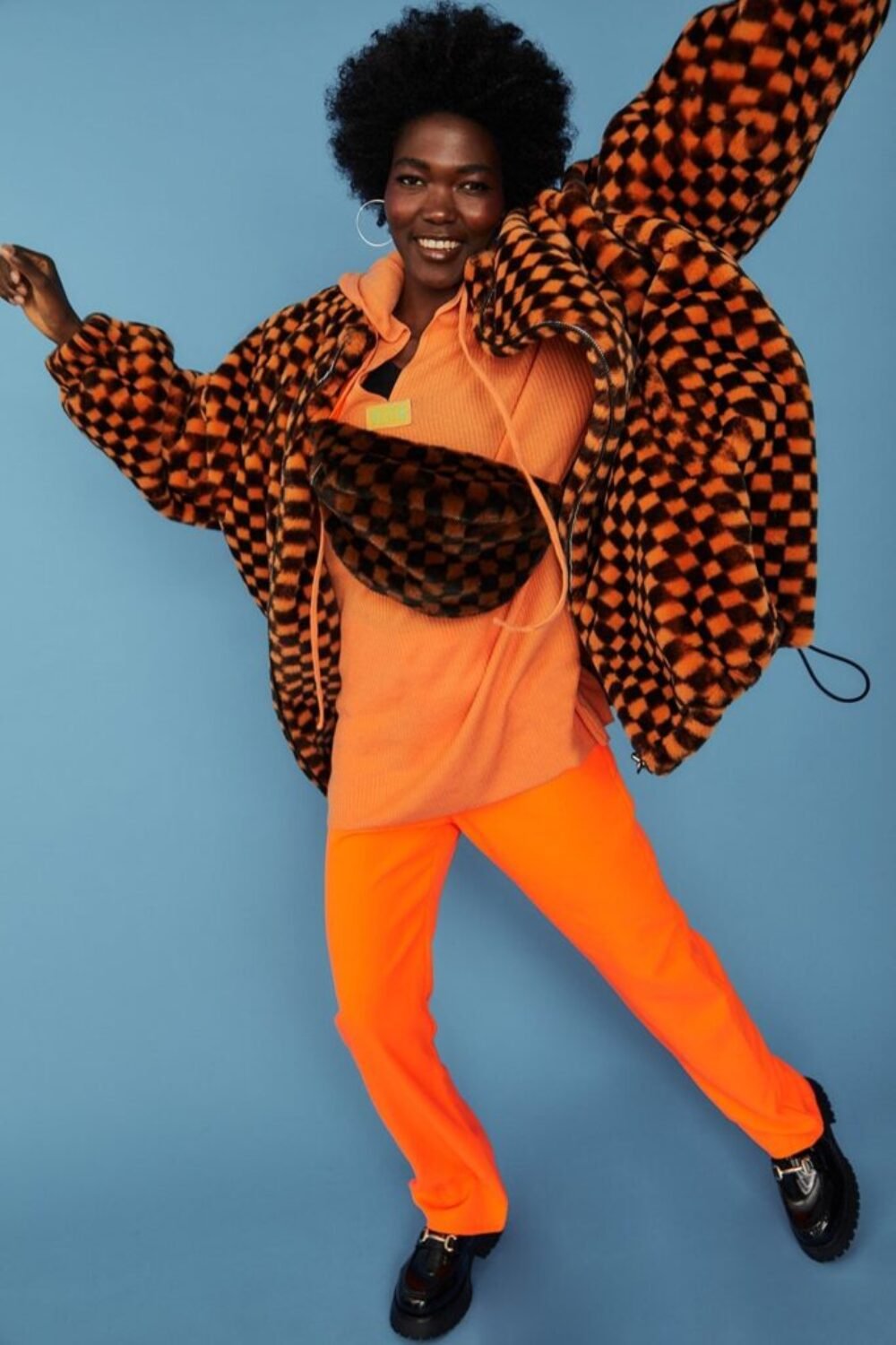 Shop Lux Orange oversized Checkered Zip Coat and women's luxury and designer clothes at www.lux-apparel.co.uk