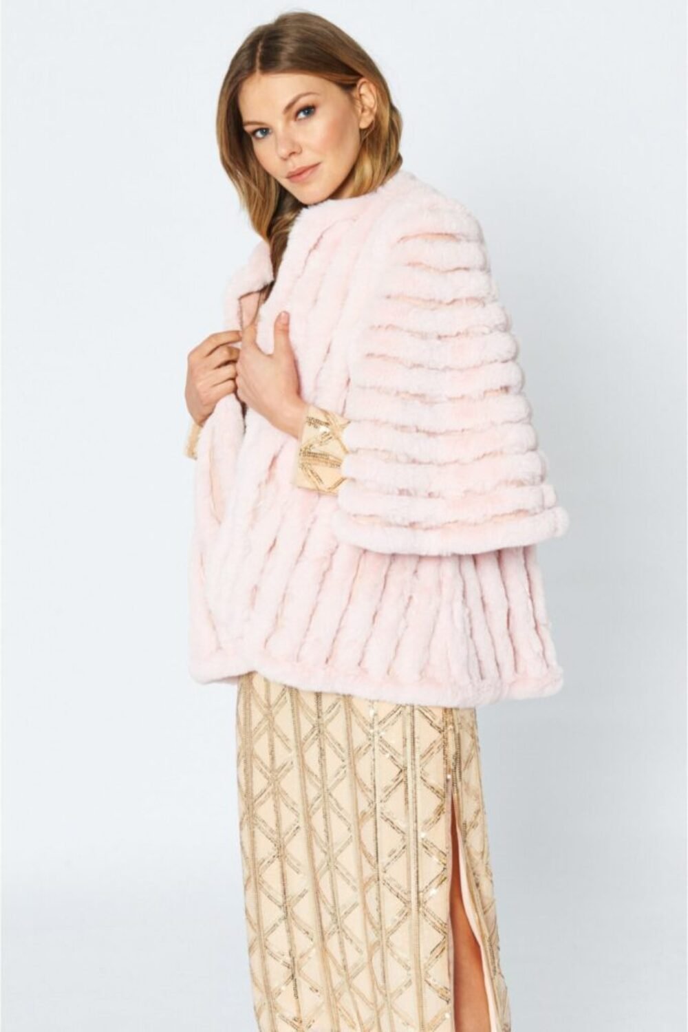 Shop Lux Pink Faux Fur Striped Coat and women's luxury and designer clothes at www.lux-apparel.co.uk