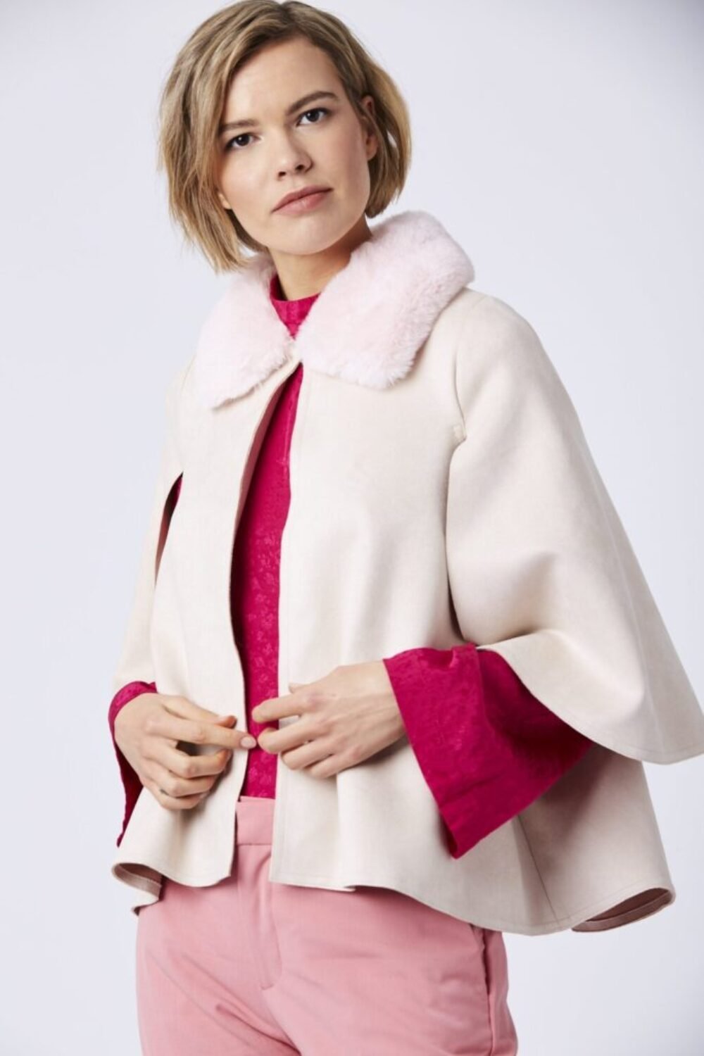 Shop Lux Pink Faux Fur and Faux Suede Cape Jacket and women's luxury and designer clothes at www.lux-apparel.co.uk