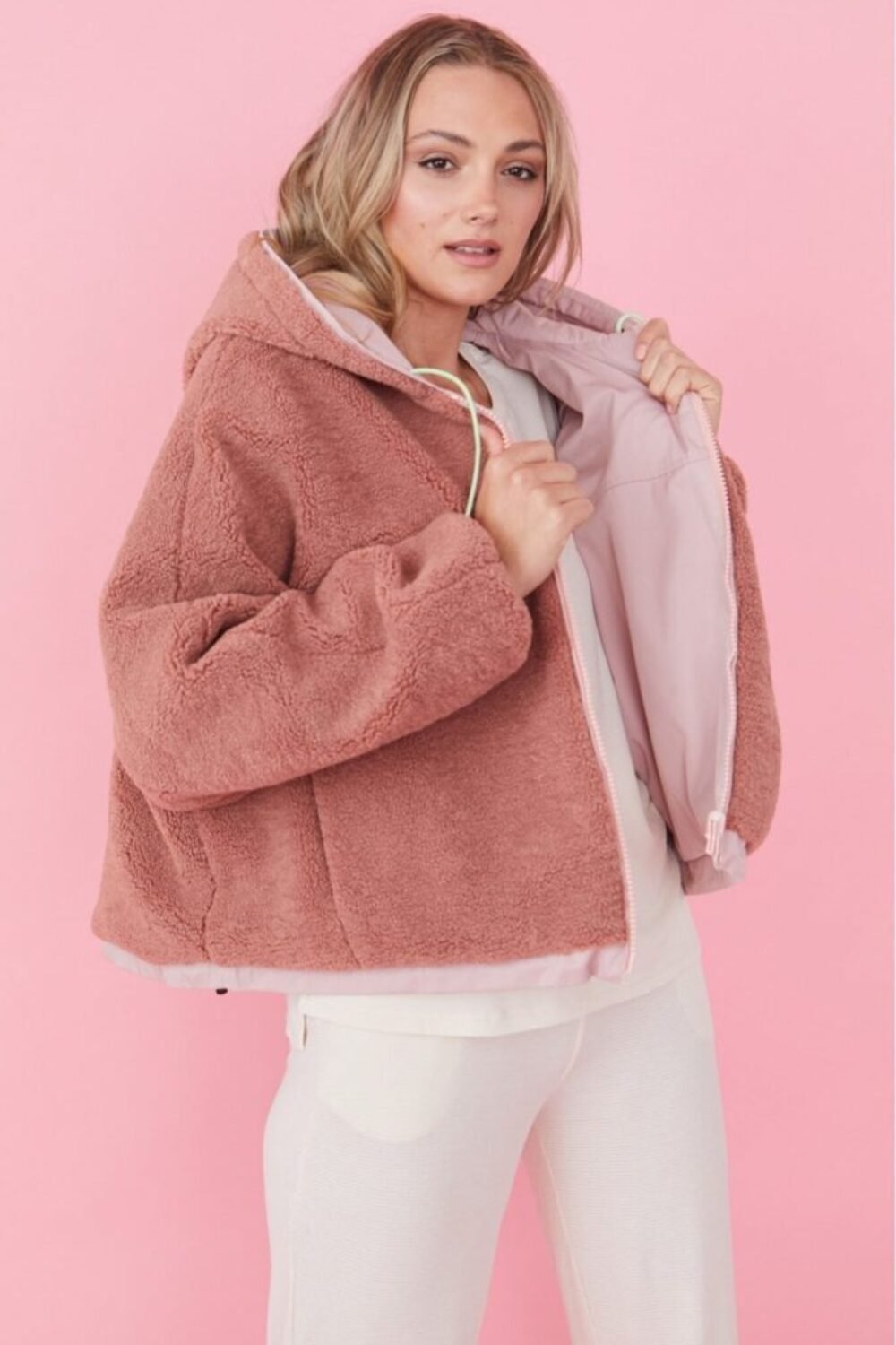 Shop Lux Pink Faux Shearling Reversible Hoodie Bomber Jacket and women's luxury and designer clothes at www.lux-apparel.co.uk