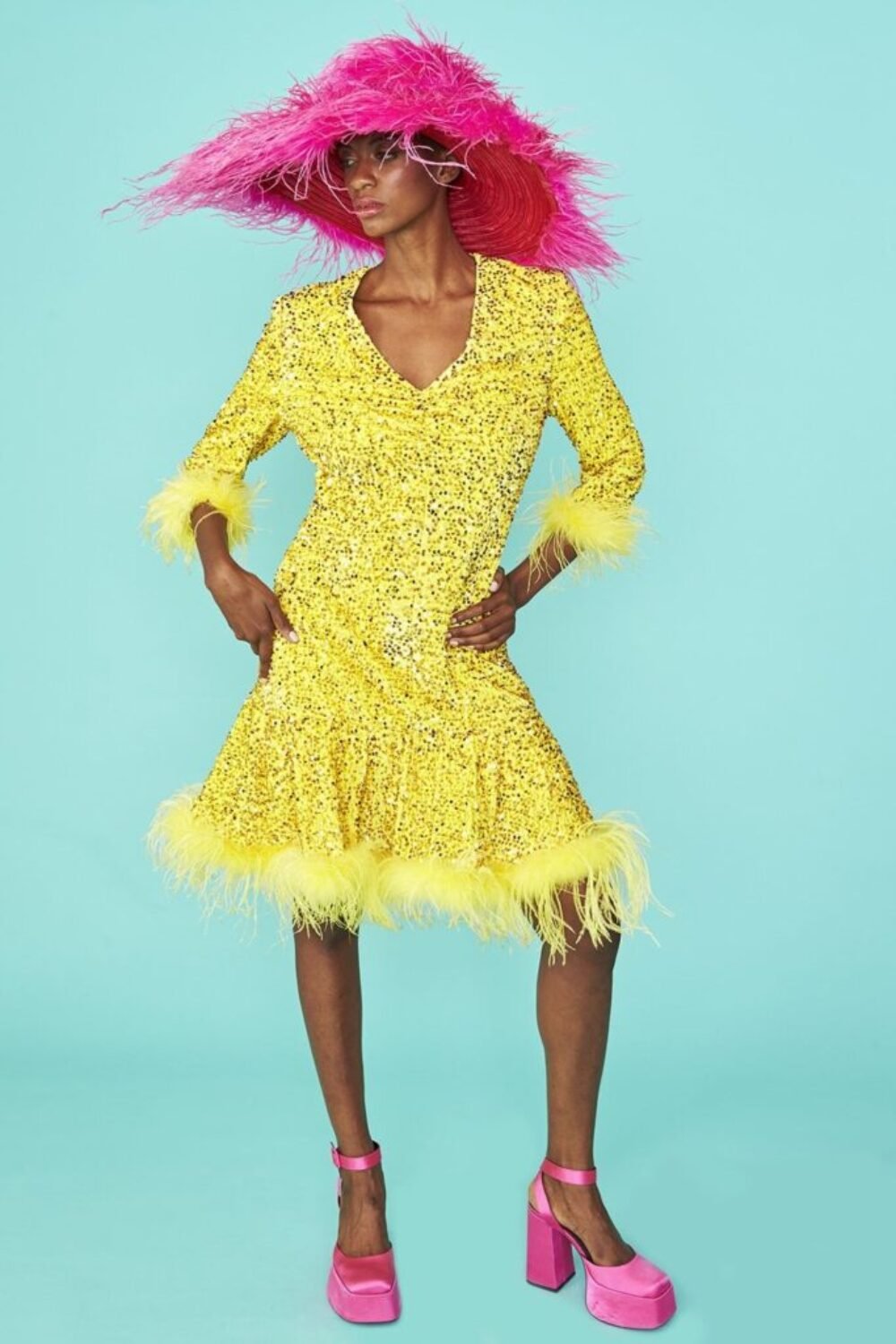 Shop Lux Yellow Sequin Skater Dress with Feather Trim and women's luxury and designer clothes at www.lux-apparel.co.uk