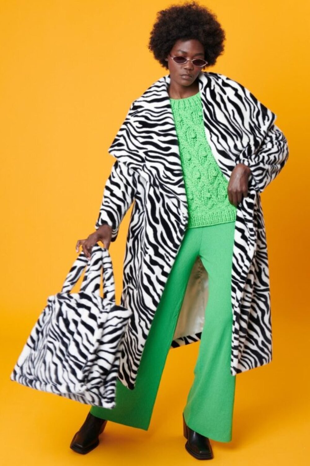 Shop Lux Zebra Print Faux Fur Maxi Coat and women's luxury and designer clothes at www.lux-apparel.co.uk