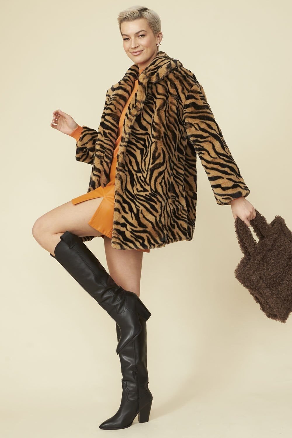 Shop Tiger Print Faux Fur Midi Coat at www.lux-apparel.co.uk