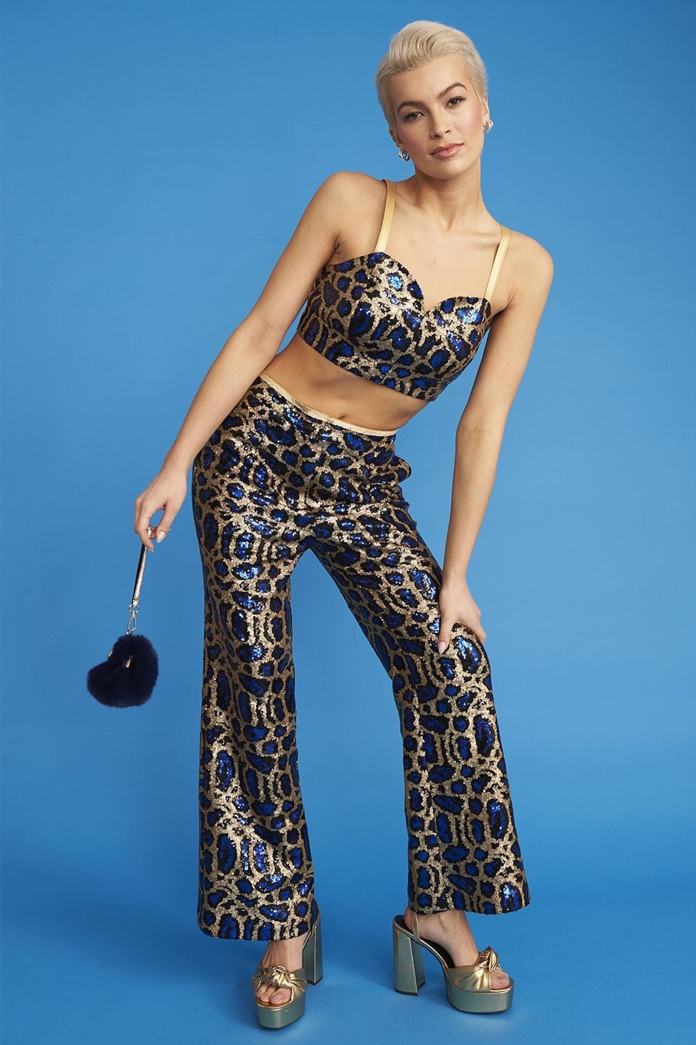 Shop Blue Animal Print Sequin Trousers and women's luxury and designer clothes at www.lux-apparel.co.uk